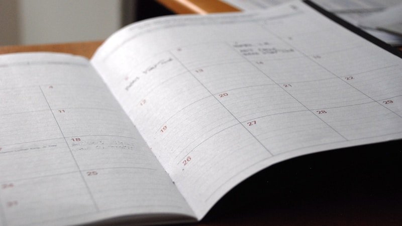 Calendar and planner showing time blocks for productive scheduling